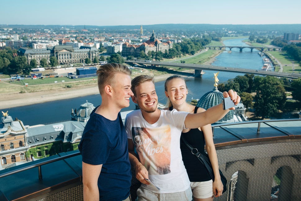 Friends taking a selfie on the dome of the Frauenkirche