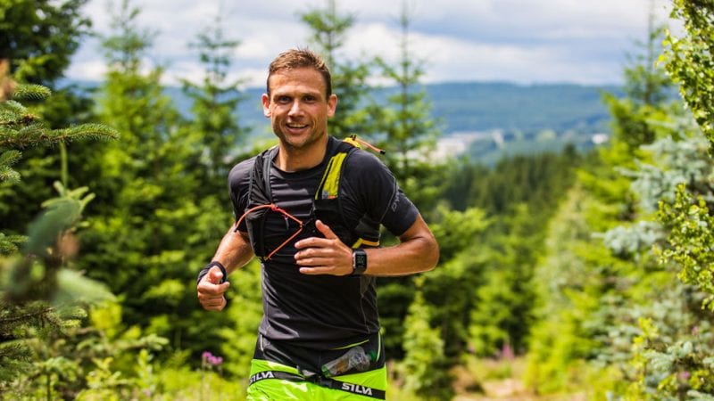 a runner in the forest