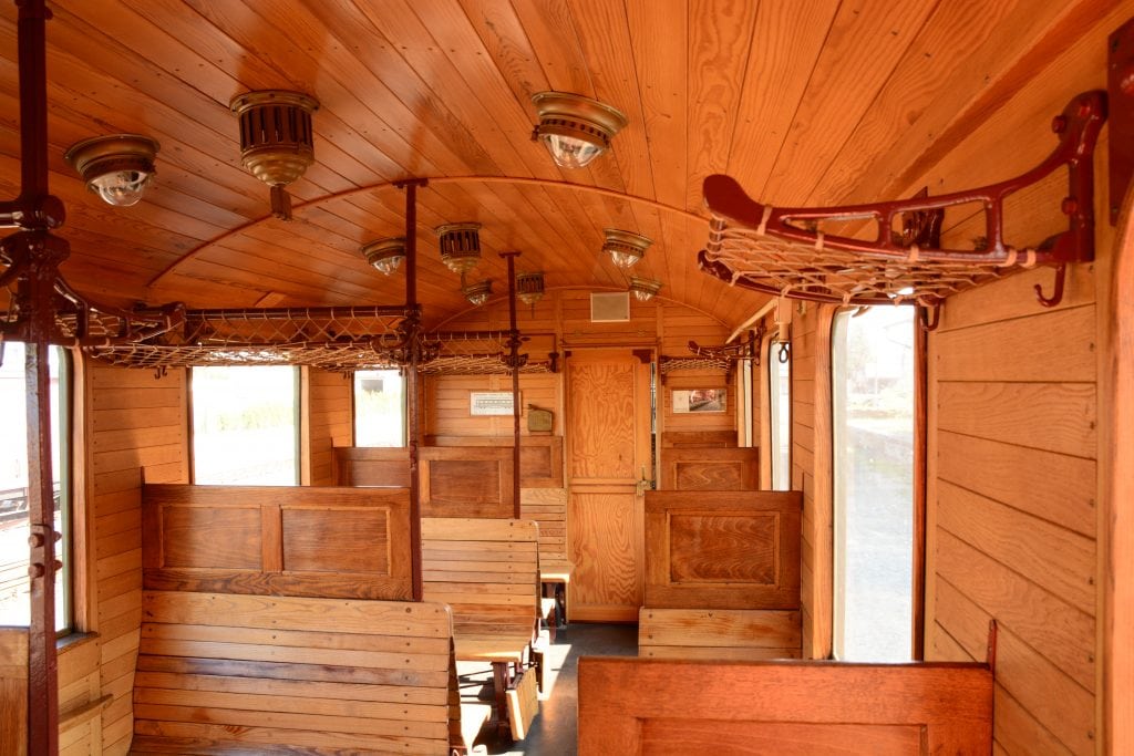 The inside of a coach. You can easily forget that the wooden seats of the Third Class compartments were once considered uncomfortable.